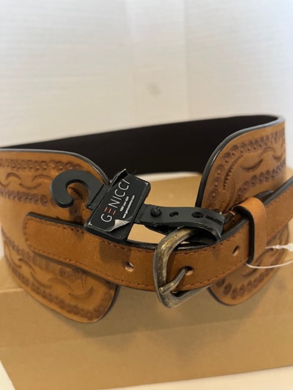 GENICCI tooled leather belt.